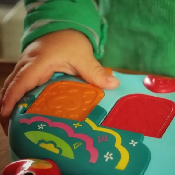 Two Children Carefully Writing